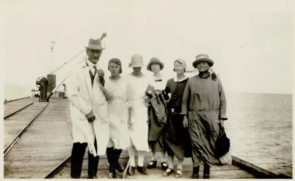 1924. Family at Port Melbourne pier.  Notes from Edith:  From left:  “Dad” (WJ Inglis), Hilda, Muriel [friend], Edie, Ida, “Mum” (Emily) .